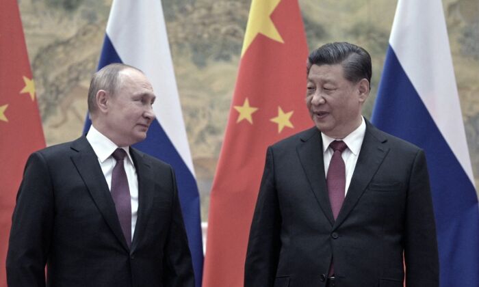 Russian President Vladimir Putin and Chinese leader Xi Jinping meet in Beijing on Feb. 4, 2022. (Alexei Druzhinin/Sputnik/AFP via Getty Images)