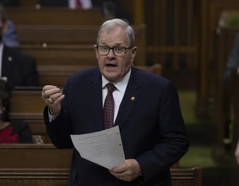 Veterans Affairs Minister Lawrence MacAulay rises during Question Period, Dec. 14, 2021 in Ottawa. (The Canadian Press/Fred Chartrand)