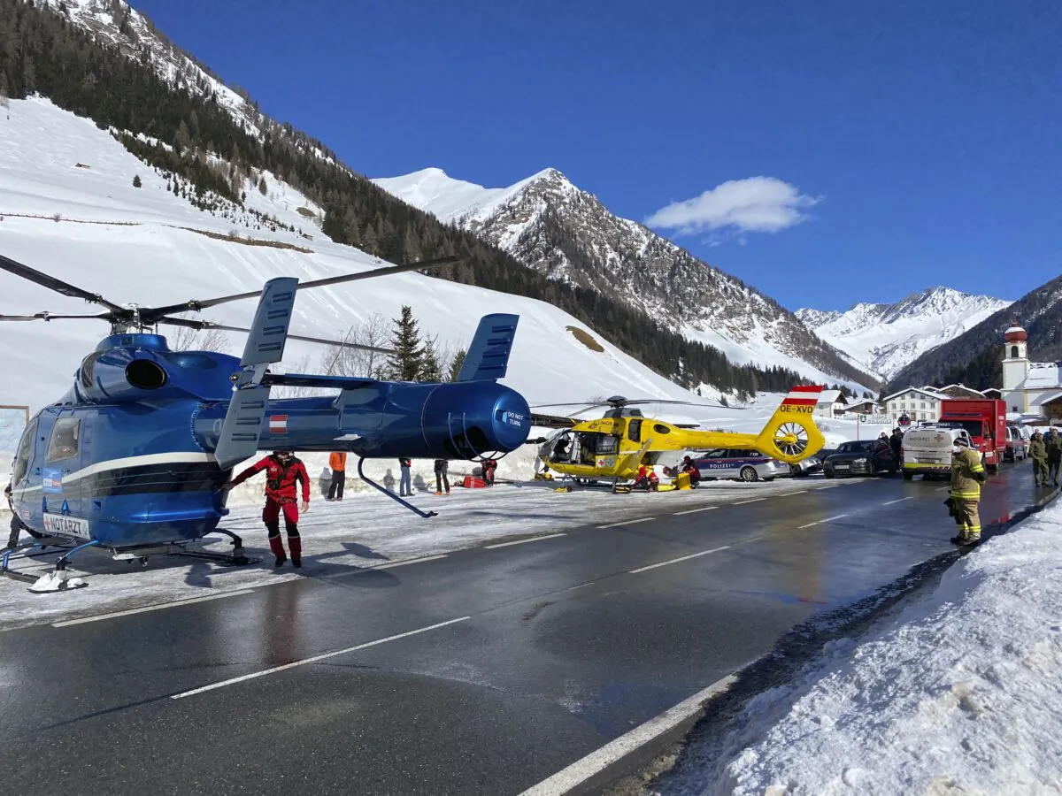 Rescue helicopters stand on a street near the Gammerspitze, Austria, after an avalanche killed one person on Feb. 4, 2022. (Zeitungsfoto.at/APA/AFP via Getty Images)