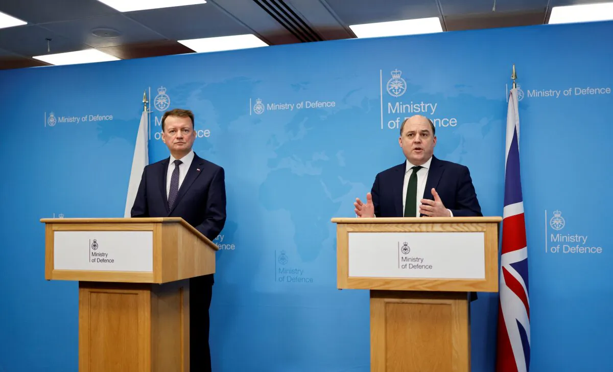 Britain's Defence Secretary Ben Wallace (R) speaks during a joint press conference with Poland's Defence Minister Mariusz Blaszczak at the Ministry of Defence in central London on Feb. 7, 2022. (Tolga Akmen/Pool/AFP via Getty Images)