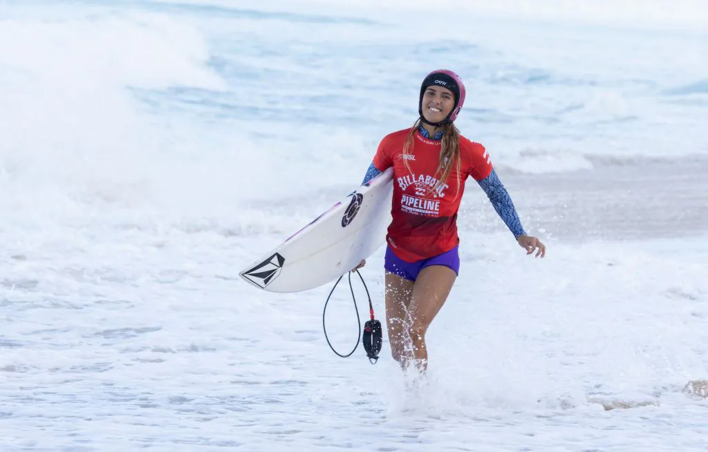 Hawaii's Moana Jones Wong exits the water at the end of her heat during the 2022 Women's Billabong Pipeline Pro finals at Banzai Pipeline on the north shore of Oahu, Hawaii, on February 6, 2022. - Moana Jones Wong takes 1st place. (Photo by BRIAN BIELMANN/AFP via Getty Images)
