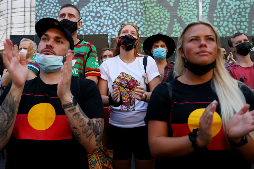 Activists take part in an 'Invasion Day' rally at Town Hall in Sydney, Australia, on Jan. 26, 2022. (Lisa Maree Williams/Getty Images)