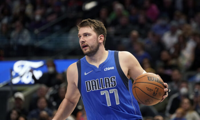 Dallas Mavericks guard Luka Doncic (77) dribbles during the first quarter of an NBA basketball game against the Atlanta Hawks in Dallas on Feb. 6, 2022. (LM Otero/AP Photo)