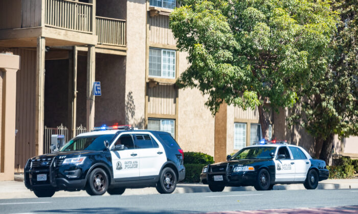 Santa Ana Police officers pull over a driver in Santa Ana, Calif., on Sept. 20, 2021. (John Fredricks/The Epoch Times)