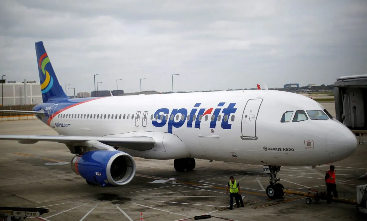 A Spirit Airlines Airbuys A320-200 airplane sits at a gate at the O'Hare Airport in Chicago, on Oct. 02, 2014. (Jim Young/Reuters)
