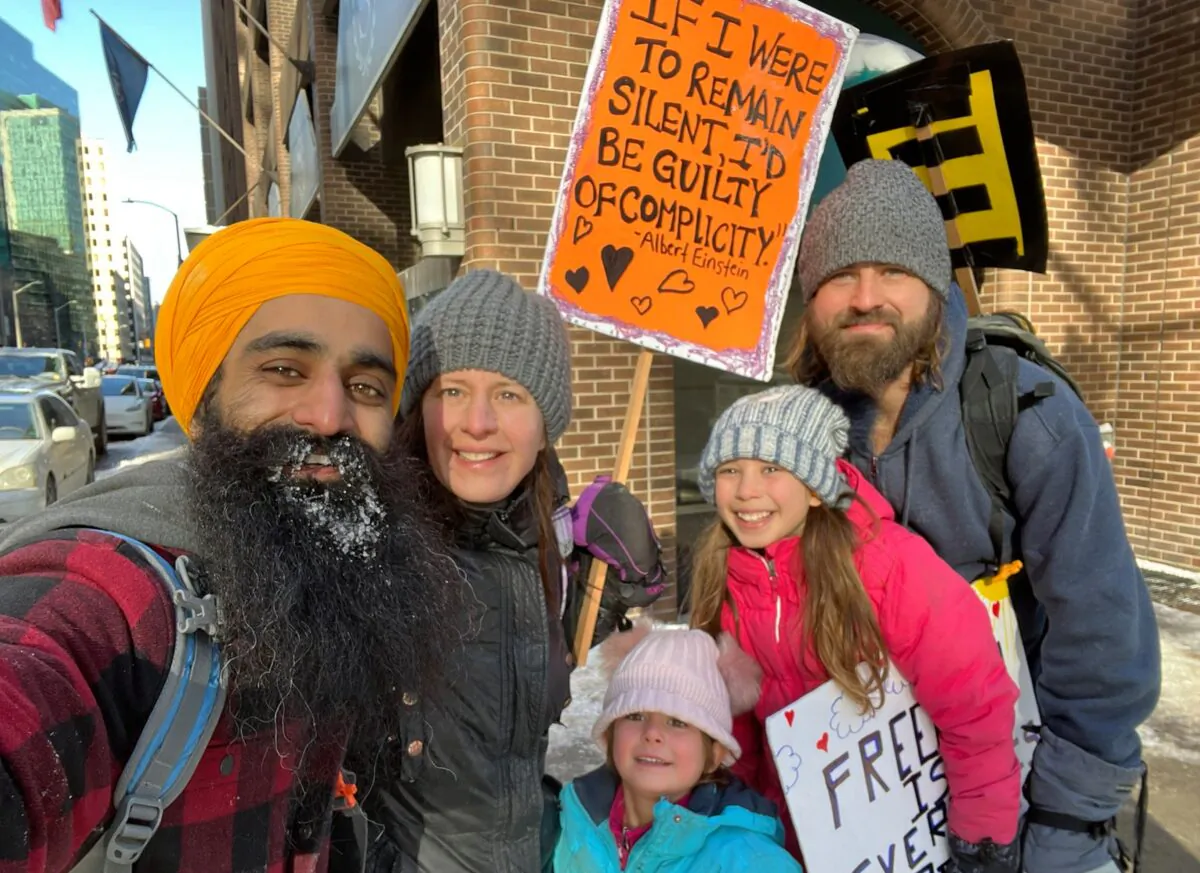 Palminder Singh (L) traveled to Ottawa from Brampton, Ontario, to protest COVID-19 mandates and restrictions. (Handout Photo)
