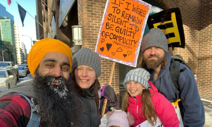 Palminder Singh (L) traveled to Ottawa from Brampton, Ontario, to protest COVID-19 mandates and restrictions. (Handout Photo)