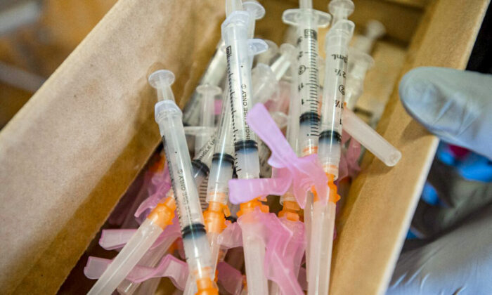 Syringes with a COVID-19 vaccine are pictured in Central Falls, R.I., in a file photograph. (Joseph Prezioso/AFP via Getty Images)
