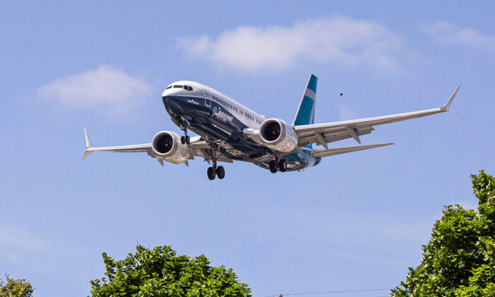 A Boeing 737 MAX airplane lands after a test flight at Boeing Field in Seattle, Wash., on June 29, 2020.  (Karen Ducey/File Photo/Reuters)
