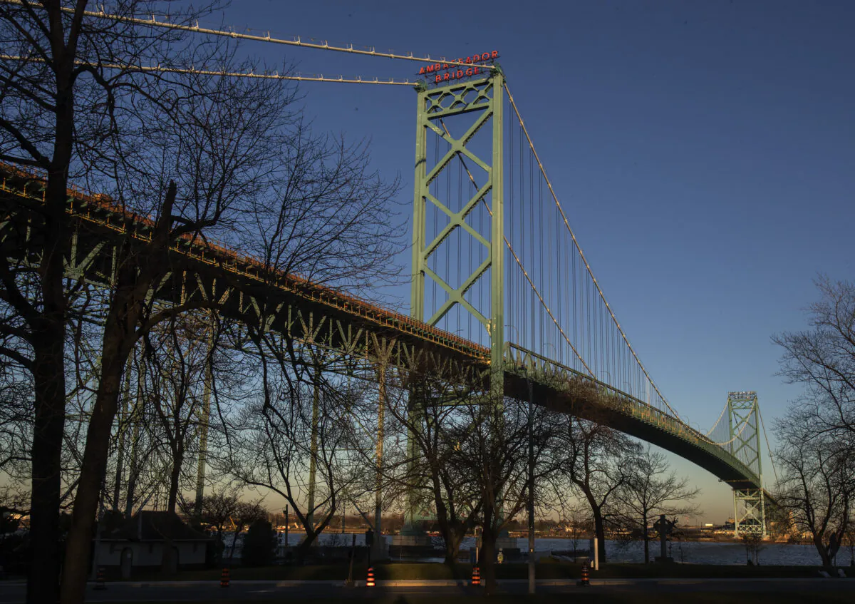 The Ambassador bridge which spans the Detroit River between Windsor and Detroit, Michigan, is shown from Windsor, Ont., on Dec. 18, 2021. (The Canadian Press/Fred Thornhill)