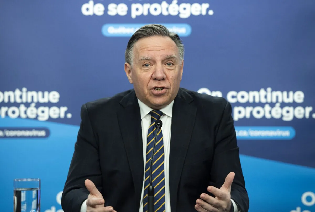 Quebec Premier Francois Legault speaks to the media at a COVID-19 press briefing in Montreal on Jan. 25, 2022. (The Canadian Press/Graham Hughes)