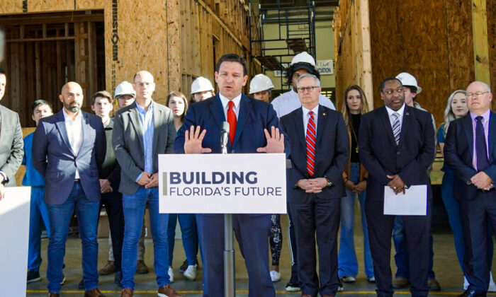 Florida Gov. Ron DeSantis speaks to reporters Feb. 2 about the need to boost hospitalized patient's rights at a press conference at Santa Fe College's construction school in Gainesville, Fla.  (Natasha Holt/The Epoch Times)