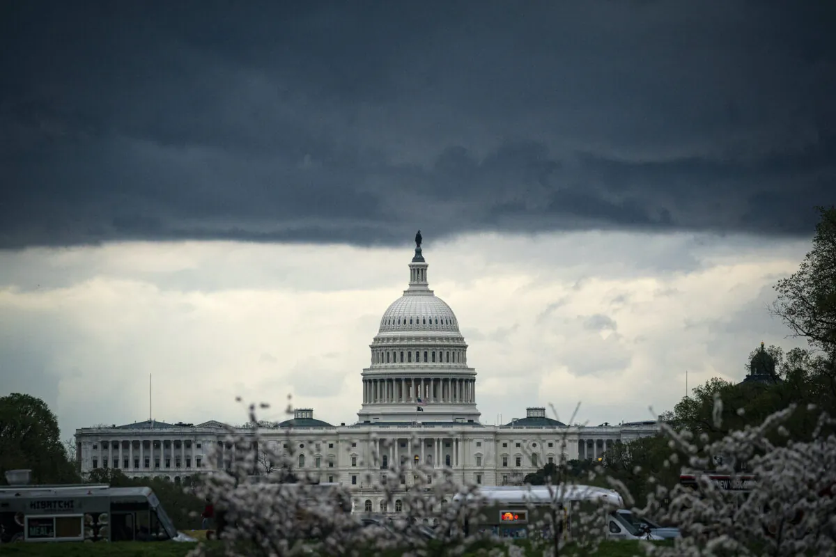 Clouds form above the U.S. Capitol on the National Mall in Washington on March 28, 2021. (Al Drago/Getty Images)