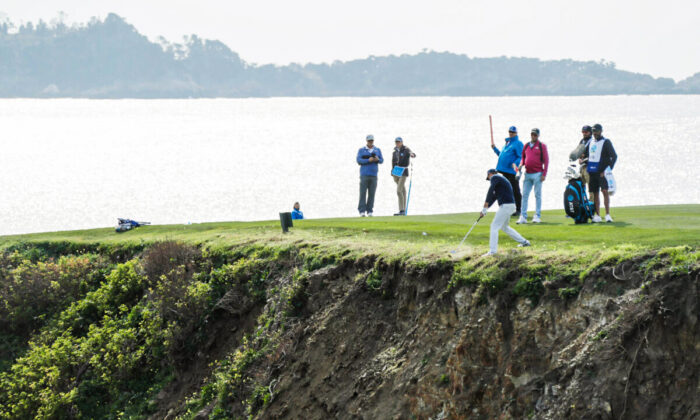 Jordan Spieth of the United States plays his second shot on the eighth hole during the third round of the AT&T Pebble Beach Pro-Am at Pebble Beach Golf Links, in Pebble Beach, Calif., on Feb. 5, 2022. (Kent Horner/Getty Images for AT&T)