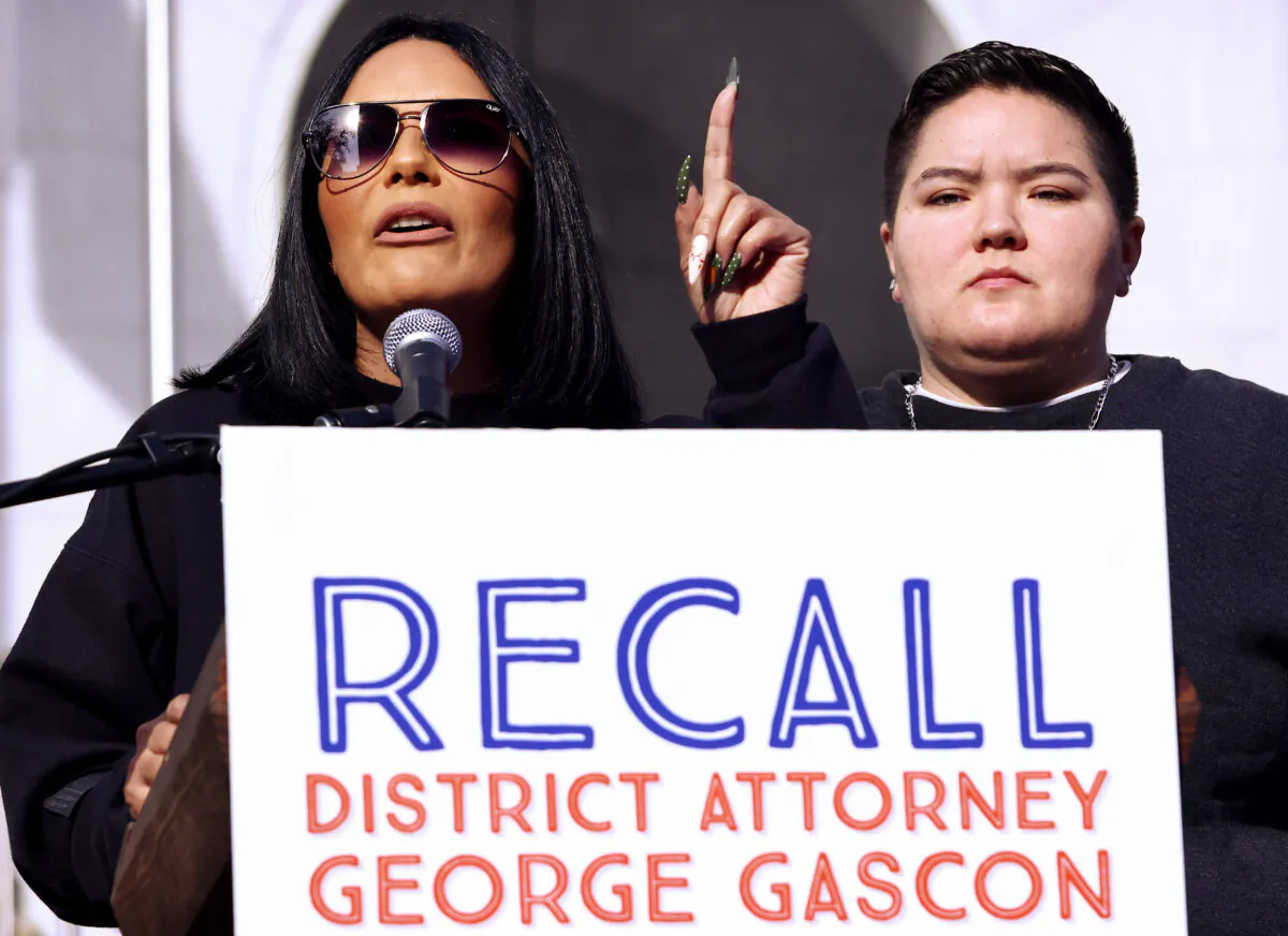 Desiree Andrade (L), whose 20-year-old son Julian Andrade was killed in 2018, speaks at a press conference with supporters of an effort to recall Los Angeles District Attorney George Gascón  on Dec. 6, 2021. Opponents of Gascón have launched a new bid to recall the progressive district attorney after an earlier effort fell short. (Photo by Mario Tama/Getty Images)