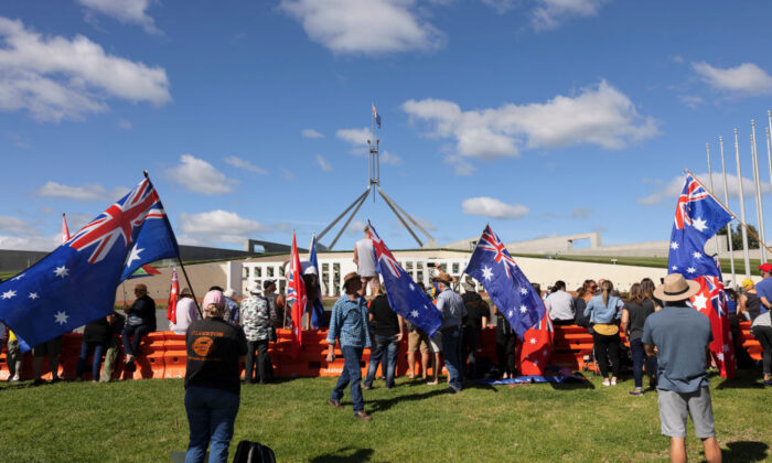 Protestors arrive at Parliament House in Canberra, Australia, on Feb. 8, 2022. (Brook Mitchell/Getty Images)