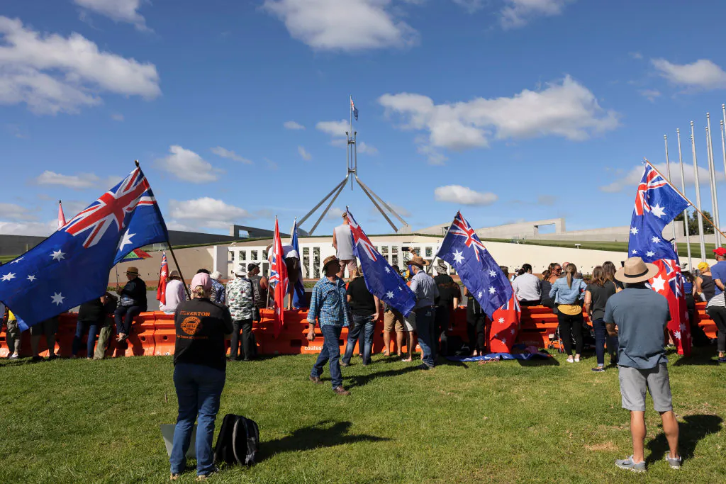 Protestors arrive at Parliament House in Canberra, Australia, on Feb. 8, 2022. (Brook Mitchell/Getty Images)