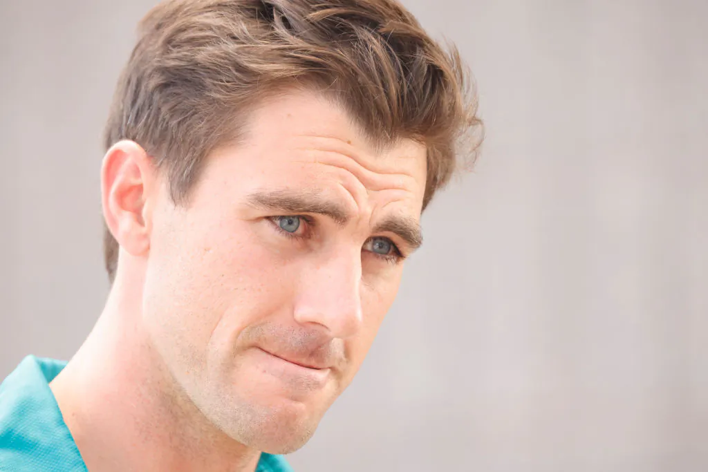 Australian captain Pat Cummins looks on during a press conference ahead of an Australia T20 Cricket team training session at Stadium Australia in Sydney on February 09, 2022. (Photo by Mark Evans/Getty Images)
