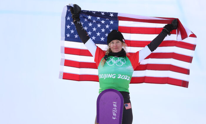 Gold medalist Lindsey Jacobellis of Team United States poses during the Women's Snowboard Cross flower ceremony on Day 5 of the Beijing 2022 Winter Olympic Games at Genting Snow Park in Zhangjiakou, China, on Feb. 9, 2022. (Ezra Shaw/Getty Images)