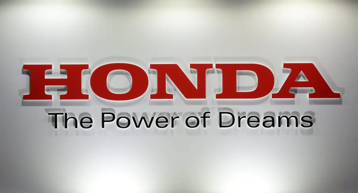 A logo of Japanese auto giant Honda Motor is displayed at the Smart Community exhibition in Tokyo, on June 17, 2015. (Yoshikazu Tsuno/AFP via Getty Images)