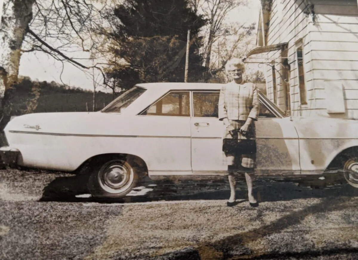 The author's grandmother, Mildred Whitaker, in a Pendleton suit by her new car, headed to work. (Courtesy of Donna Rinehart) 