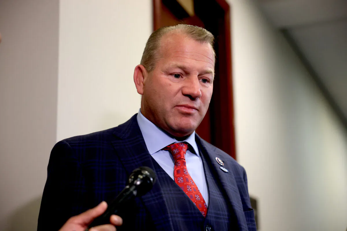 Rep. Troy Nehls (R-Texas) speaks with reporters as he departs from a caucus meeting with House Republicans on Capitol Hill in Washington on July 20, 2021. (Anna Moneymaker/Getty Images)