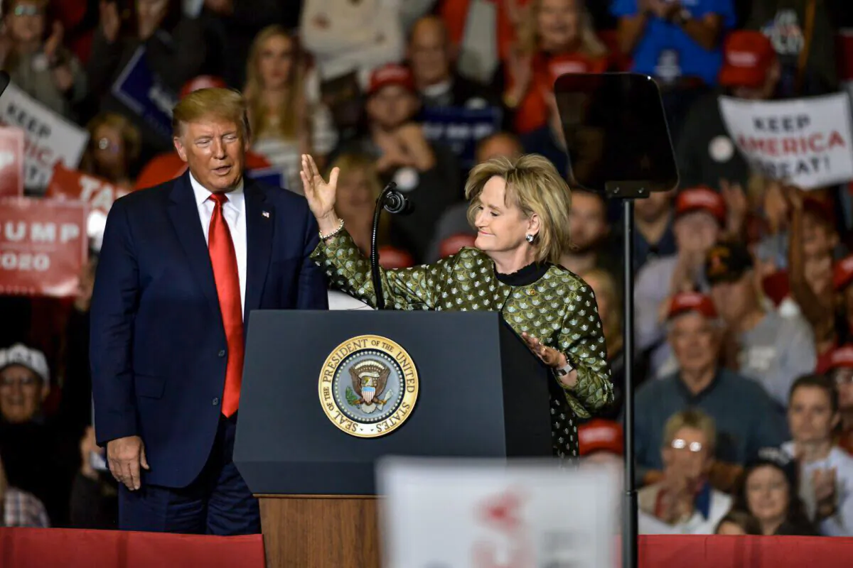 Sen. Cindy Hyde-Smith (R-Miss.) speaks alongside President Donald Trump during a "Keep America Great" campaign rally at BancorpSouth Arena on November 1, 2019 in Tupelo, Mississippi. Trump is campaigning in Mississippi ahead of a state gubernatorial election where Republican Tate Reeves is in a close race with Democrat Jim Hood. Reeves won the election. (Photo by Brandon Dill/Getty Images)