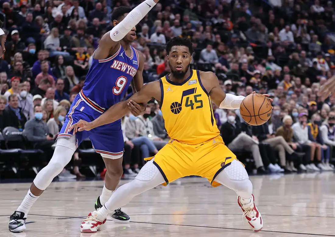 Utah Jazz guard Donovan Mitchell (45) steps back to take a shot defended by New York Knicks guard RJ Barrett (9) in the third quarter at Vivint Arena in Salt Lake City, Utah, on Feb. 7, 2022. (Rob Gray/USA TODAY Sports via Field Level Media)