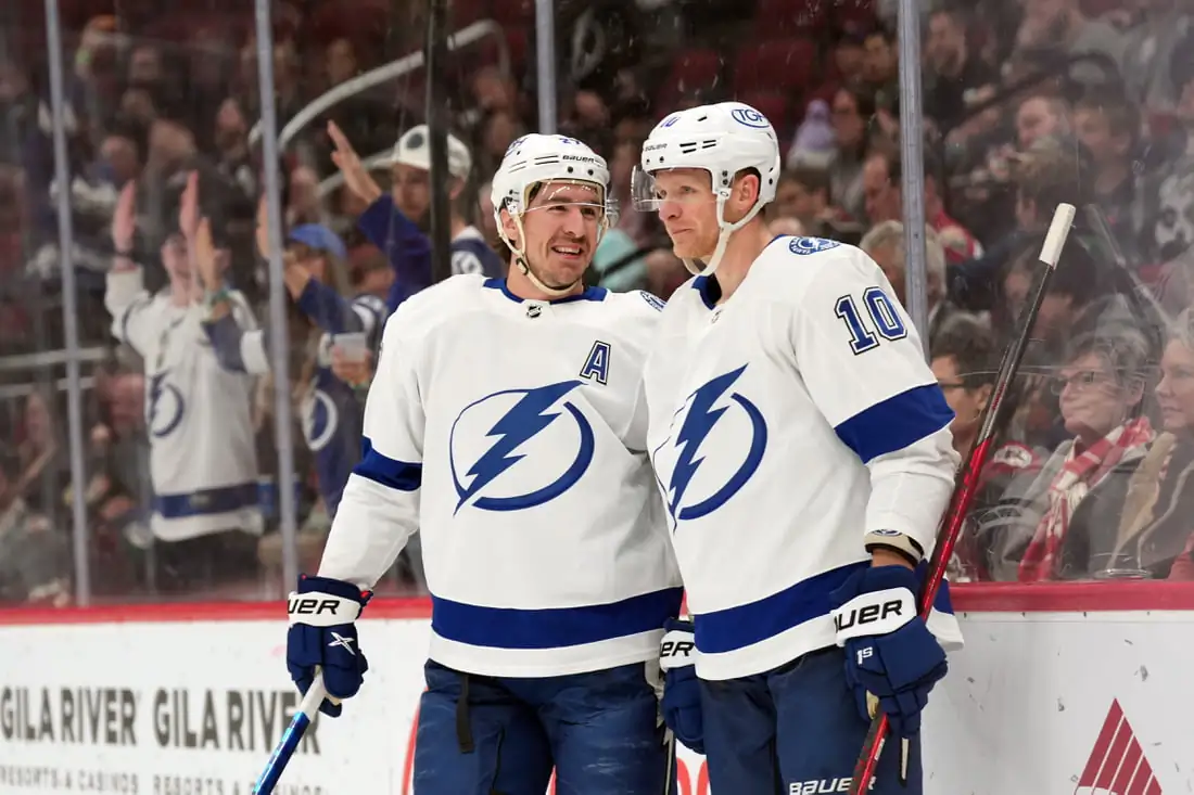 Tampa Bay Lightning right wing Corey Perry (10) celebrates his goal against the Arizona Coyotes with defenseman Ryan McDonagh (27) during the first period at Gila River Arena in US, on Feb 11, 2022. (Joe Camporeale /USA TODAY Sports via Field Level Media)