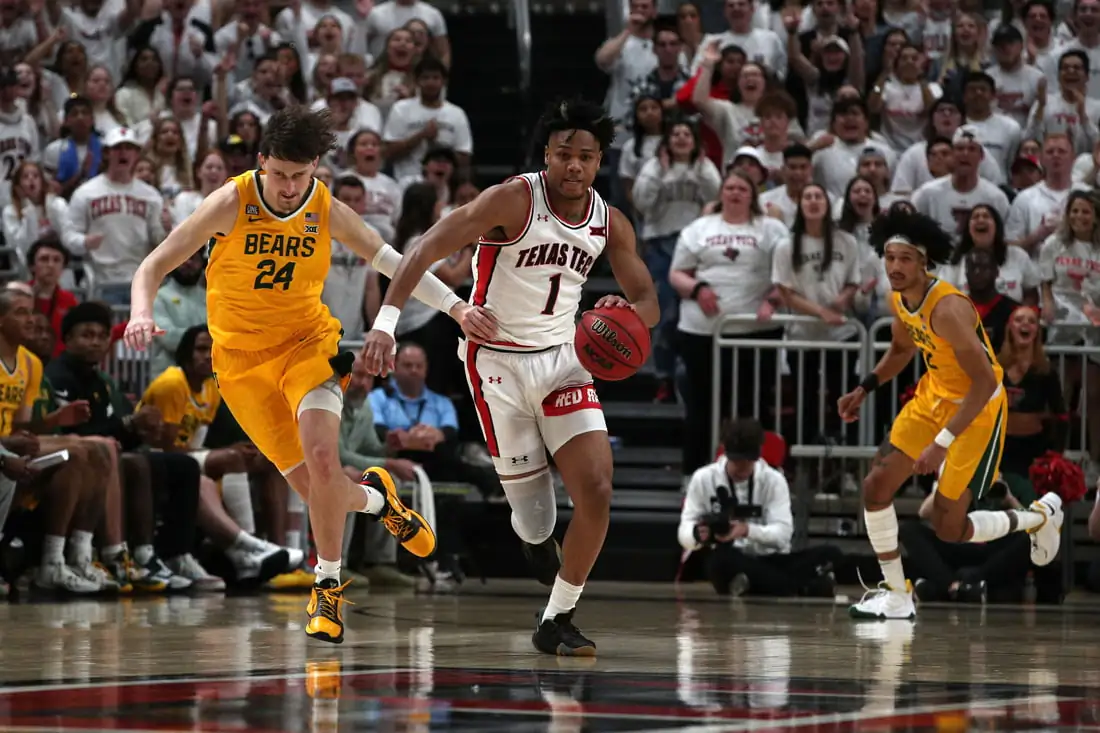Texas Tech Red Raiders guard Terrence Shannon Jr. (1) brings the ball up court against Baylor Bears guard Matthew Mayer (24) in the second half at United Supermarkets Arena in Lubbock, Texas, on Feb 16, 2022. (Credit: Michael C. Johnson-USA TODAY Sports via Field Level Media)