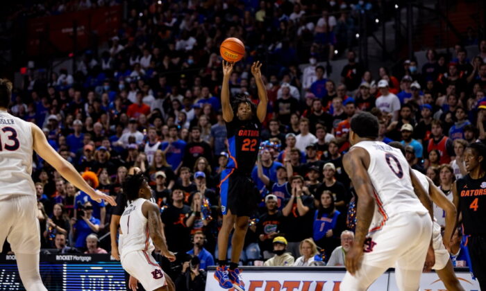 Florida Gators guard Tyree Appleby (22) makes a three pointer during the second half against the Auburn Tigers at Billy Donovan Court at Exactech Arena in Gainesville, Fla., on Feb. 19, 2022. (Matt Pendleton/USA TODAY Sports via Field Level Media)