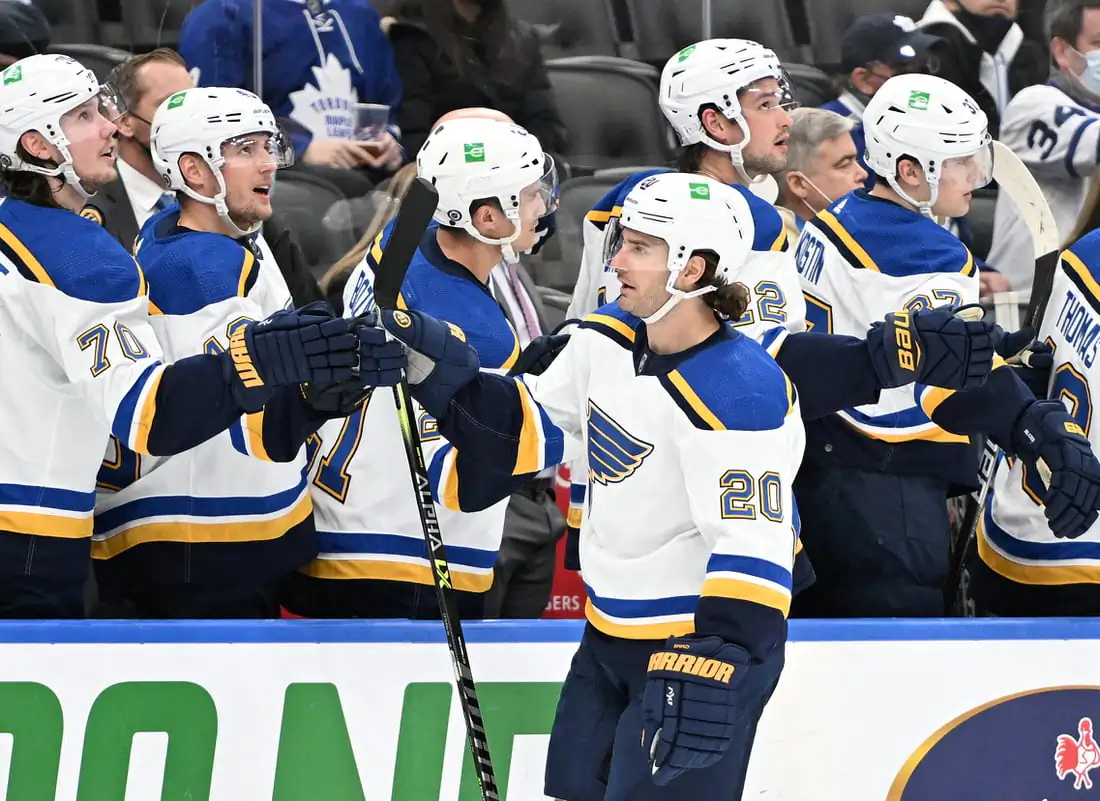 St. Louis Blues forward Brandon Saad (20) celebrates with team mates at the bench after scoring against the Toronto Maple Leafs in the third period at the Scotiabank Arena in Toronto, on Feb. 19, 2022. (Dan Hamilton/USA TODAY Sports via Field Level Media)