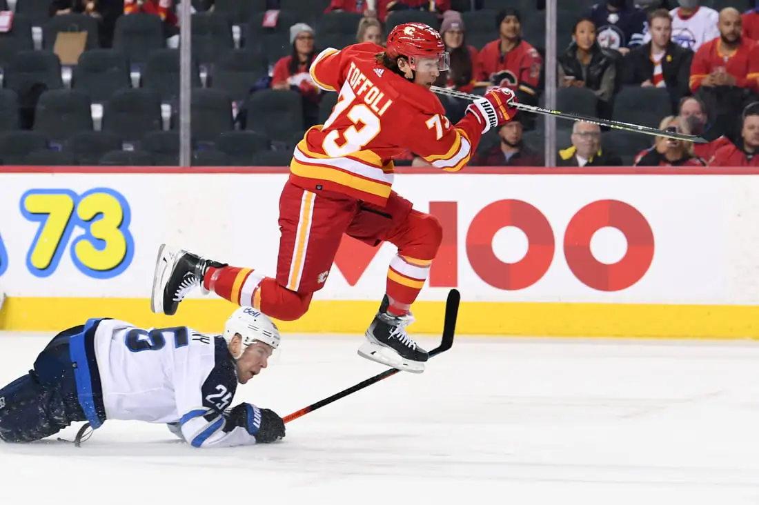 Calgary Flames forward Tyler Toffoli (73) scores on the Winnipeg Jets in the third period at Scotiabank Saddledome in Calgary, Alberta, Canada, on Feb. 21, 2022. (Candice Ward/USA TODAY Sports via Field Level Media