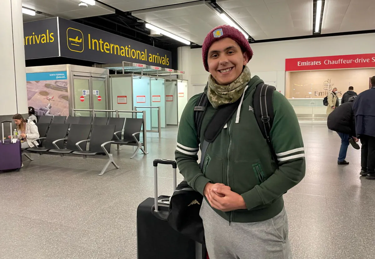 Haider Ali, 21, from Birmingham, arrives at the Gatwick airport in London from Kyiv, Ukraine, on Feb. 12, 2022. (Sophie Wingate/PA)