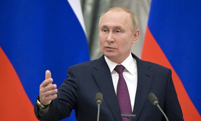Russian President Vladimir Putin is said to be moving forces to the Ukraine border (Sergey Guneev, Sputnik, Kremlin Pool Photo via AP)