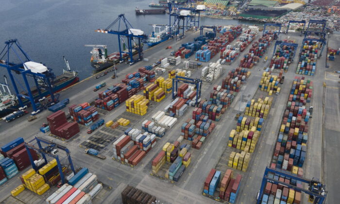 Stacks of containers line the Manila North Harbour Port, Inc. in Manila, Philippines, on Oct. 19, 2021. (Aaron Favila/AP Photo)