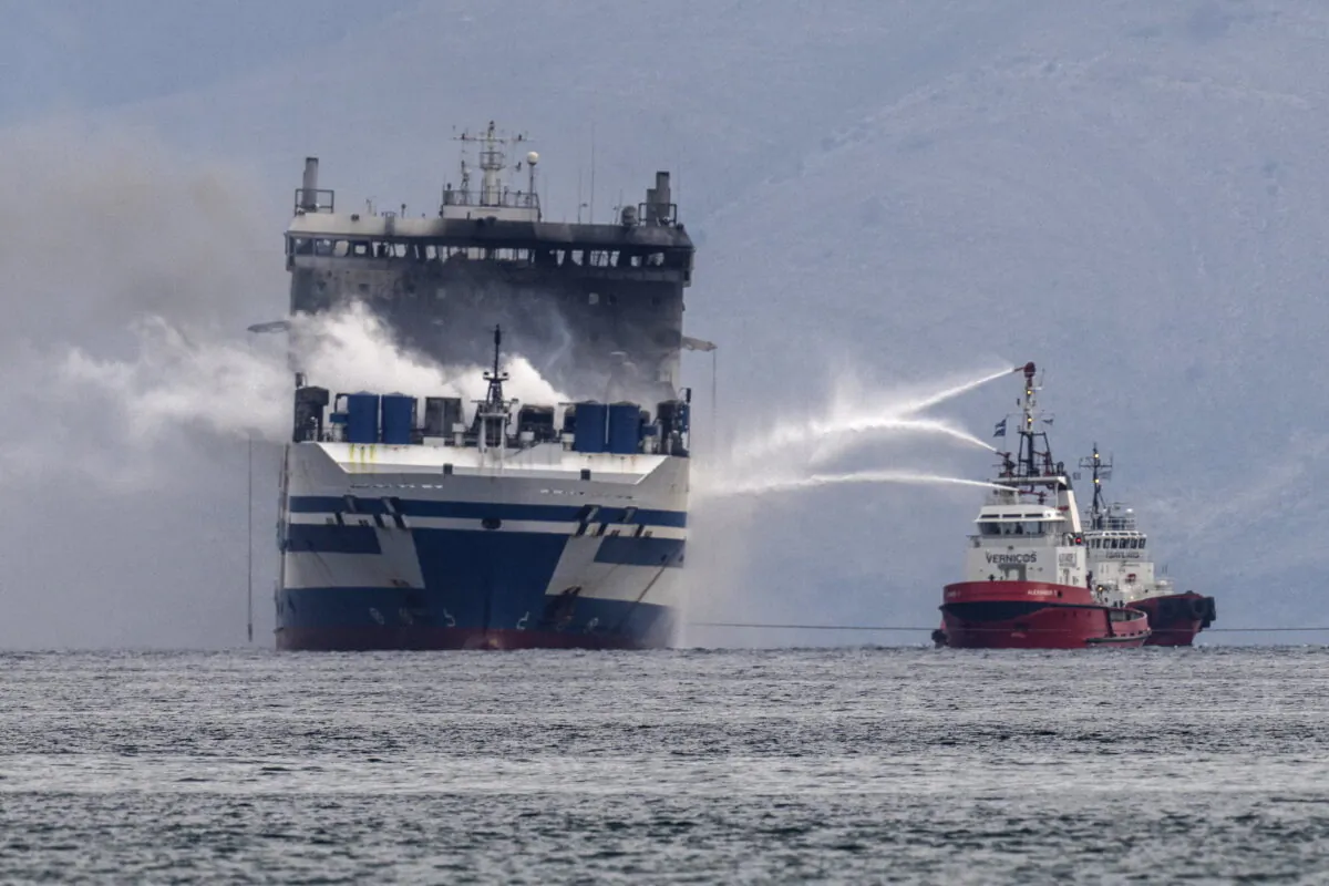 Smoke rises from the Italian-flagged Euroferry Olympia, which is on fire for the third day, in the Ionian Sea near the Greek island of Corfu, on Feb. 20, 2022. (Petros Giannakouris/AP Photo)