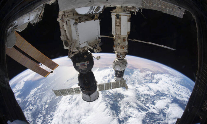 The International Space Station orbited 264 miles above the Tyrrhenian Sea with the Soyuz MS-19 crew ship docked to the Rassvet module and the Prichal module, still attached to the Progress delivery craft, docked to the Nauka multipurpose module on Dec. 6, 2021. (NASA via AP)