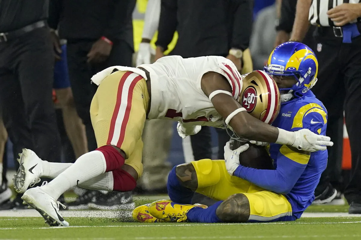 San Francisco 49ers' Jimmie Ward, left, is called for a penalty as he hits Los Angeles Rams' Odell Beckham Jr. during the second half of the NFC Championship NFL football game in Inglewood, Calif., on Jan. 30, 2022. (Mark J. Terrill/AP Photo)