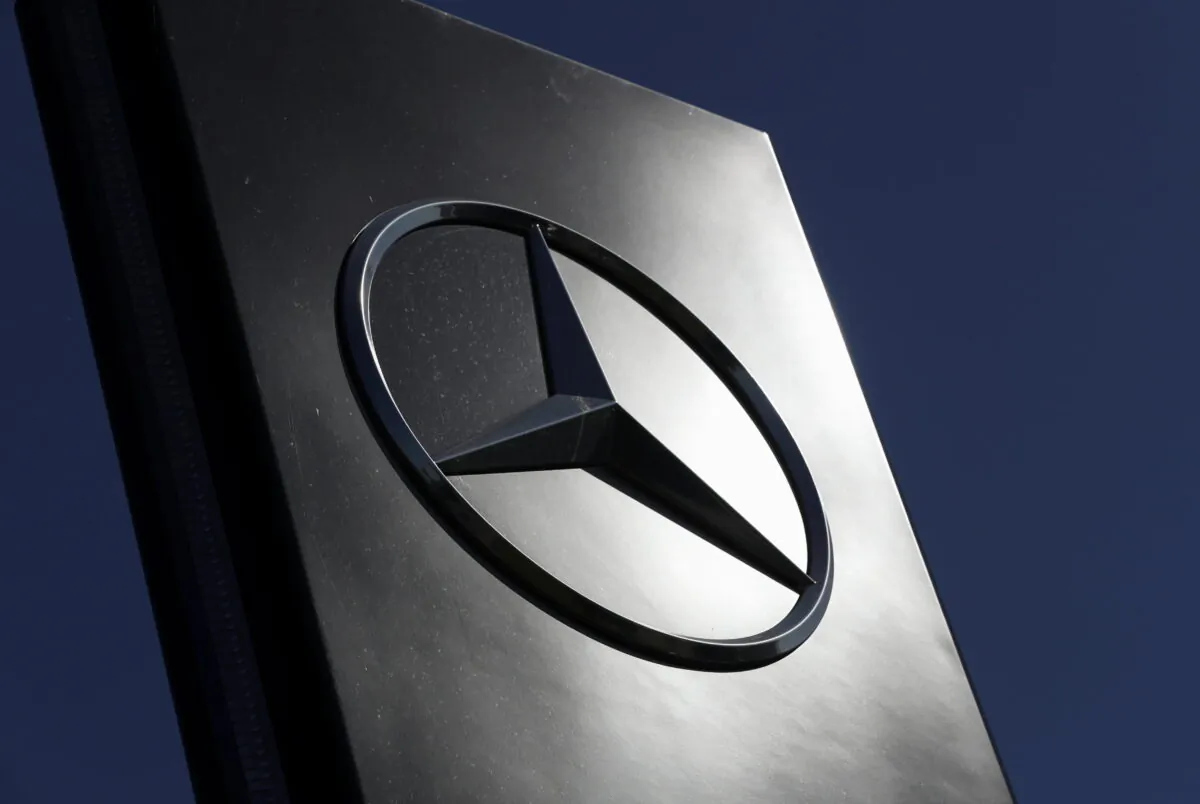 A logo of Mercedes-Benz is seen outside a Mercedes-Benz car dealer, amid the coronavirus disease (COVID-19) outbreak in Brussels, Belgium, on May 28, 2020. (Yves Herman/Reuters)