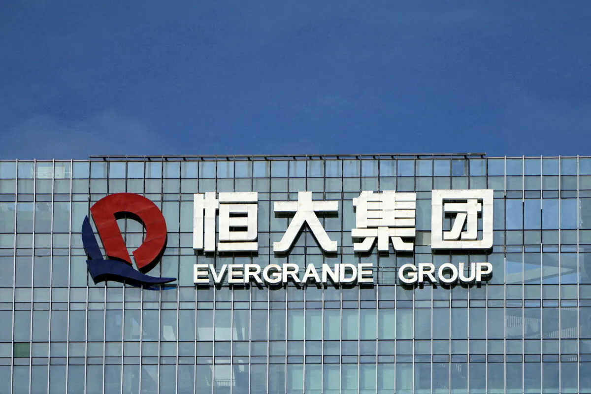 The company logo is seen on the headquarters of China Evergrande Group in Shenzhen, Guangdong province, China, on Sept. 26, 2021. (Aly Song/Reuters)