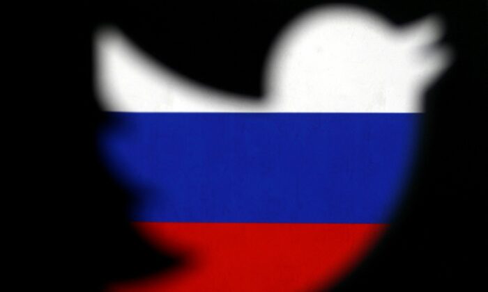 A 3D-printed Twitter logo displayed in front of Russian flag is seen in this illustration picture, on Oct. 27, 2017. (Dado Ruvic/Illustration/Reuters)