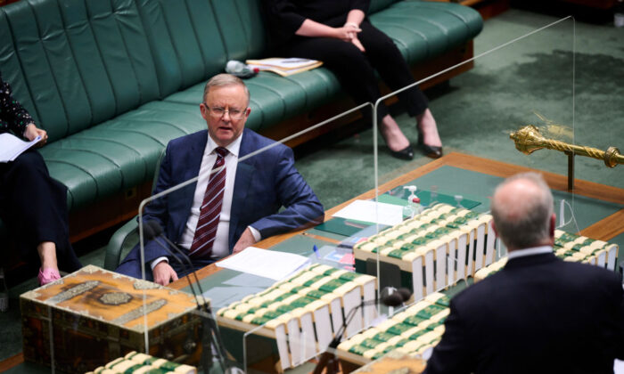 Australian Opposition Leader Anthony Albanese reacts as Prime Minister Scott Morrison speaks during the question time at Parliament House in Canberra, Australia, on Aug. 23, 2021. (Rohan Thomson/Getty Images)