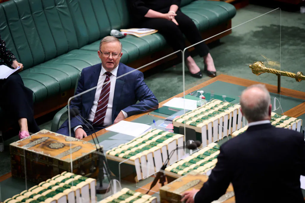 Australian Opposition Leader Anthony Albanese reacts as Prime Minister Scott Morrison speaks during the question time at Parliament House in Canberra, Australia, on Aug. 23, 2021. (Rohan Thomson/Getty Images)
