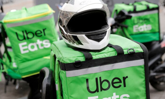 Delivery bags with logos of Uber Eats are seen on a street in central Kiev, Ukraine on May 27, 2020. (Valentyn Ogirenko/Reuters File Photo)