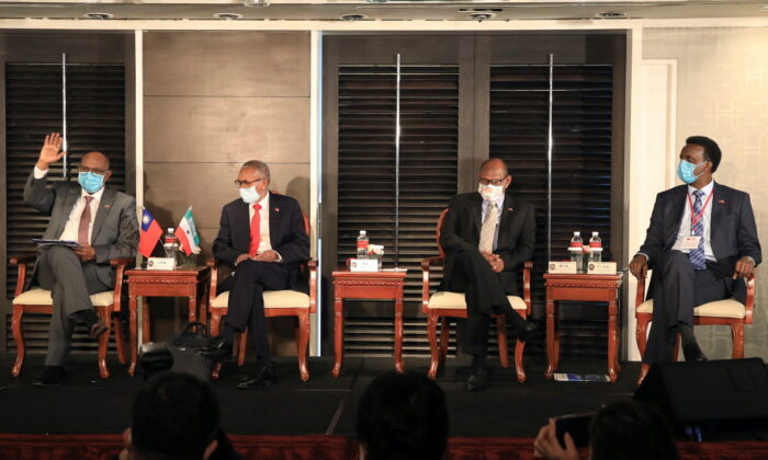 Somaliland's Foreign Minister Essa Kayd Mohamoud, Minister of Financial Development Saad Ali Shire, Minister of Livestock and Fishery Development Saeed Sulub Mohamed, and Minister of Planning and National Development Omar Ali Abdilahi attend a news conference in Taipei, Taiwan, on Feb. 11, 2022. (I-Hwa Cheng/Reuters)