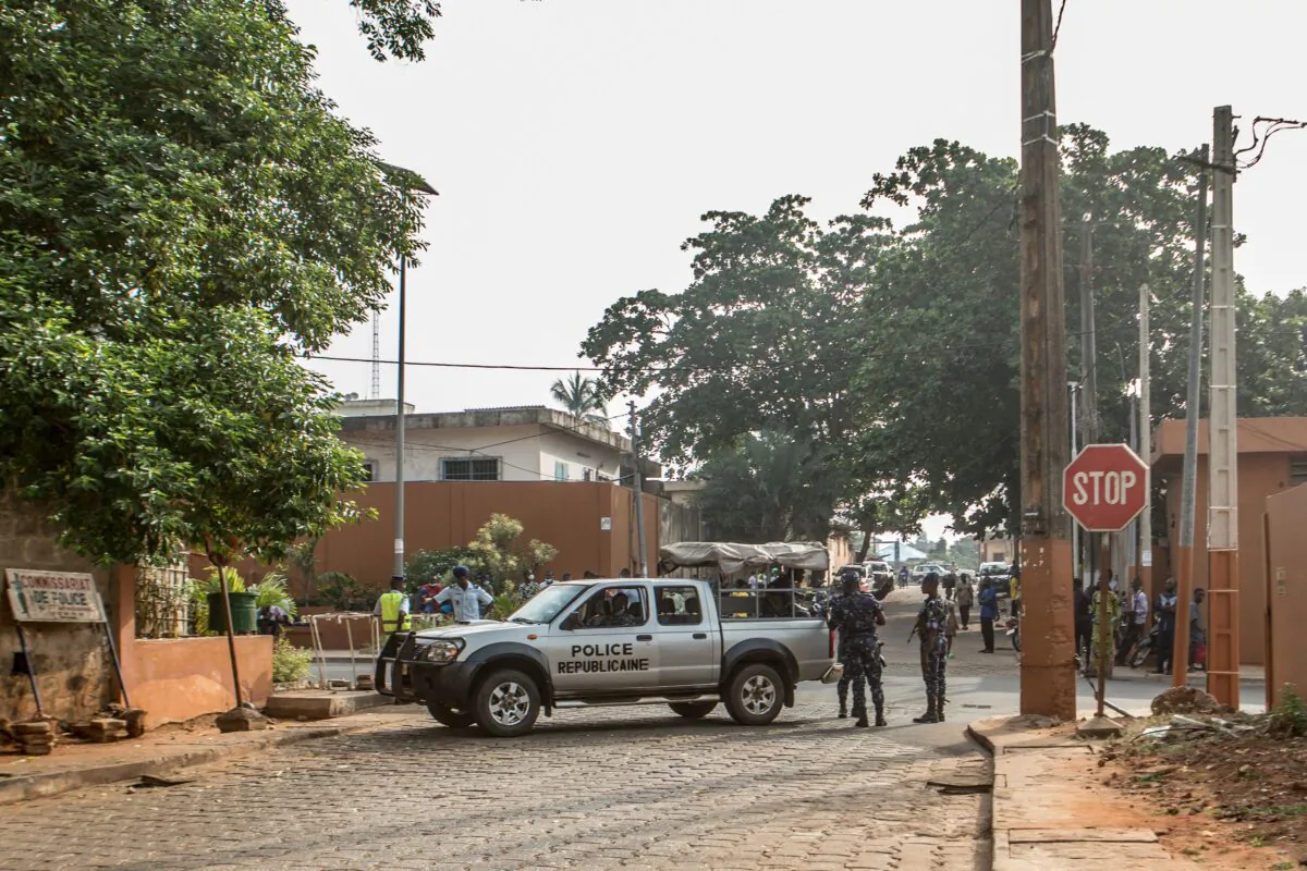 Police officers stand guard in Porto-novo, Benin, on Dec. 10, 2021. (Yanick Folly/AFP via Getty Images)