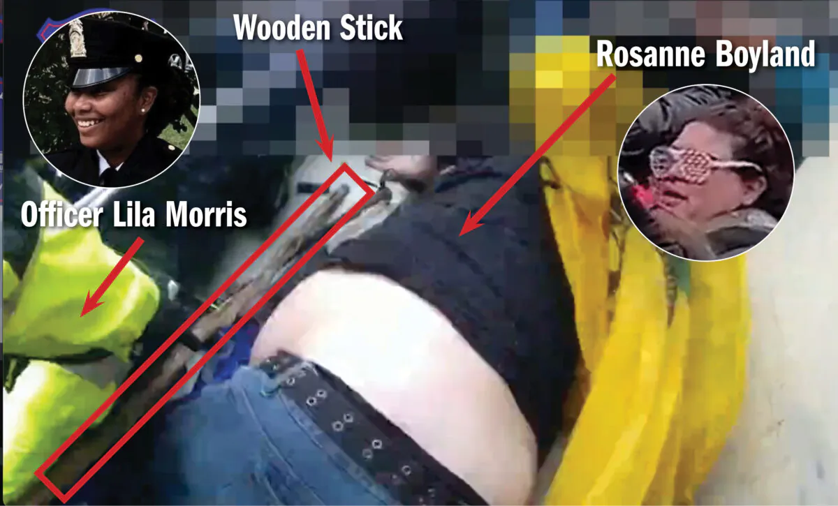 Video still from bodycam footage showing Officer Lila Morris picking up a wooden stick that she used to beat Rosanne Boyland. (Metropolitan Police Department/Graphic by The Epoch Times)
