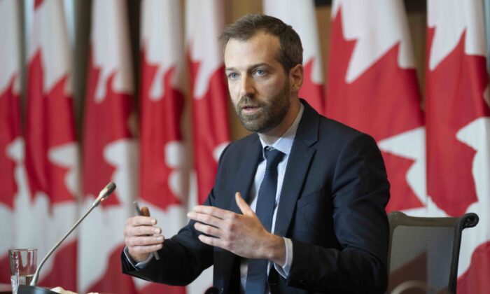 Liberal MP Joël Lightbound speaks about COVID-19 restrictions during a news conference in Ottawa on Feb. 8, 2022, calling on his government to change its divisive tone on the issue. (The Canadian Press/Adrian Wyld)