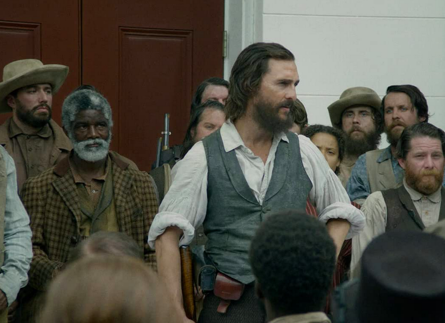 a gathering of men in free state of jones